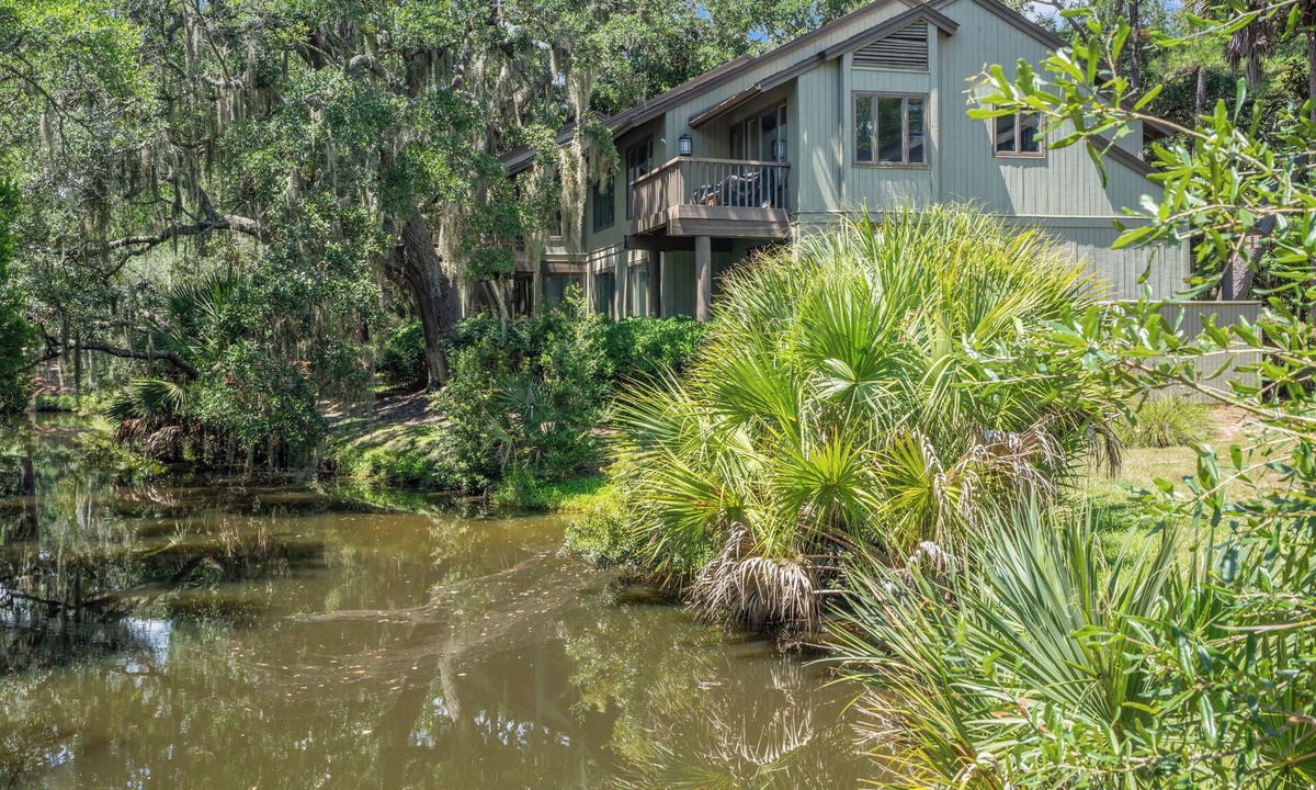 West Beach Village Villa | Fairway Oaks Villa! Lagoon views! Short 5-7 minute stroll to the beach!