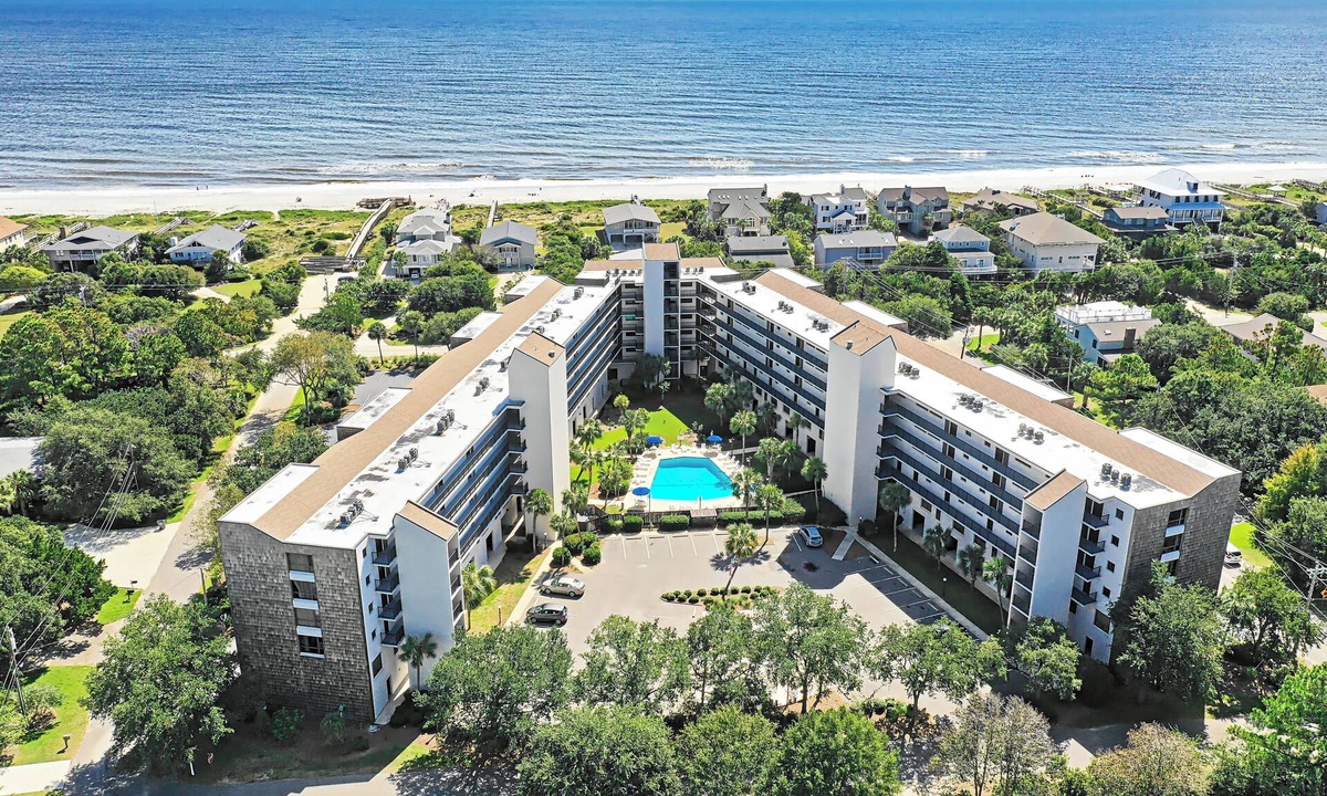 North Litchfield Beach Condo | Fourth Floor Condo across from Beach Access, Balcony, Pool, Grill Area, Elevator