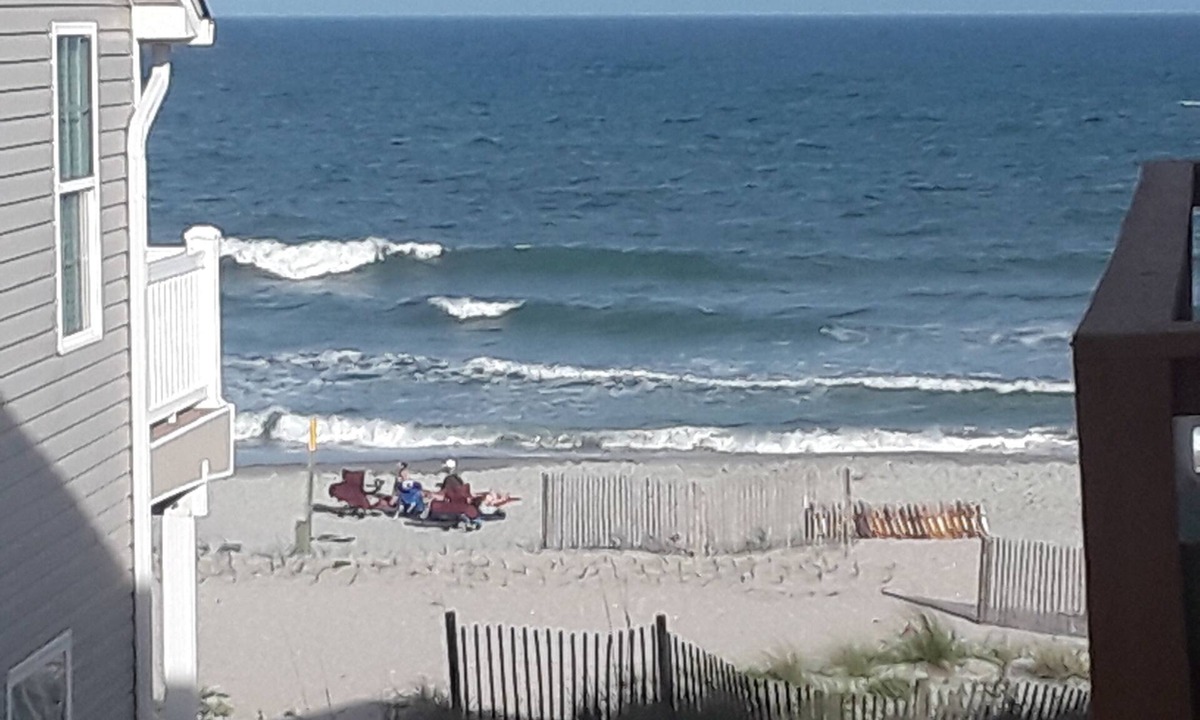 Surfside Beach House | It's high tide & you're so close to the beach you can sea it! Water Park is free
