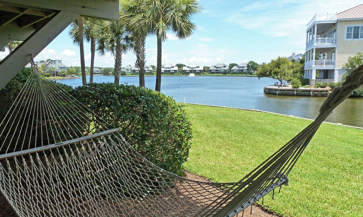 Litchfield by the Sea Condo | Lake Front Townhouse, Beach Access, Screened Porch, Sundeck, 2 Carports, Pool