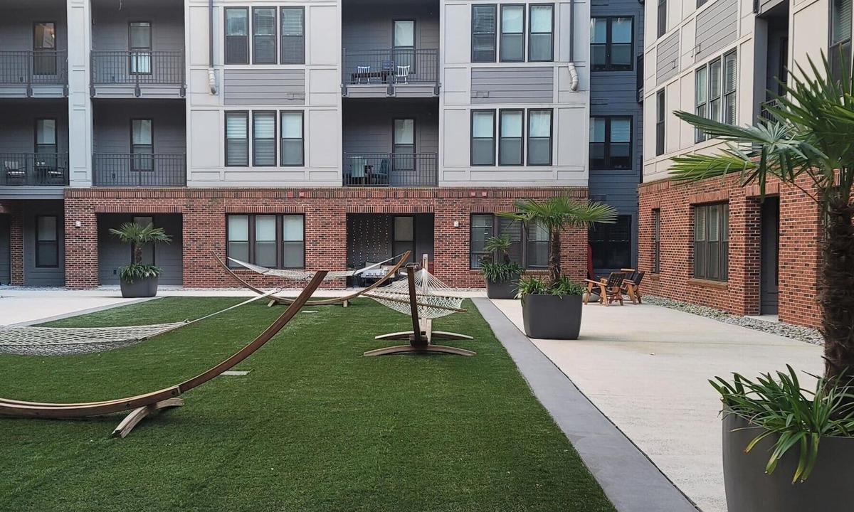 Downtown Charleston Apartment | NEW! The Luxe Escape★ East Central loft with pool, hammocks, and more!