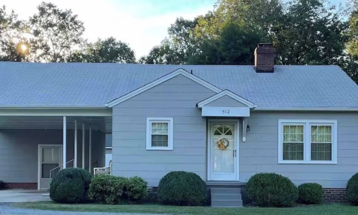 Gibsonville House | Quaint mid- century home with a great porch to relax on and enjoy nature.
