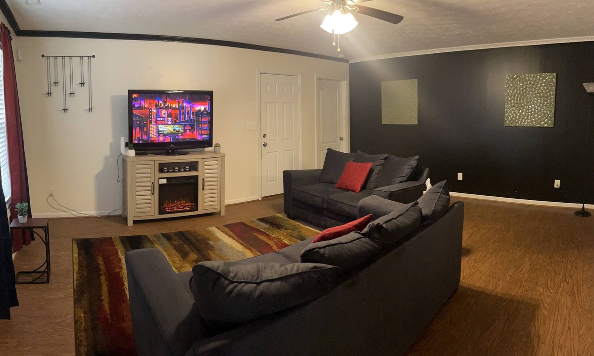 Terry Sanford House | Stay in a cozy downtown cottage within 5 mi of I-95, Hwy 301 & NC Hwy 87!