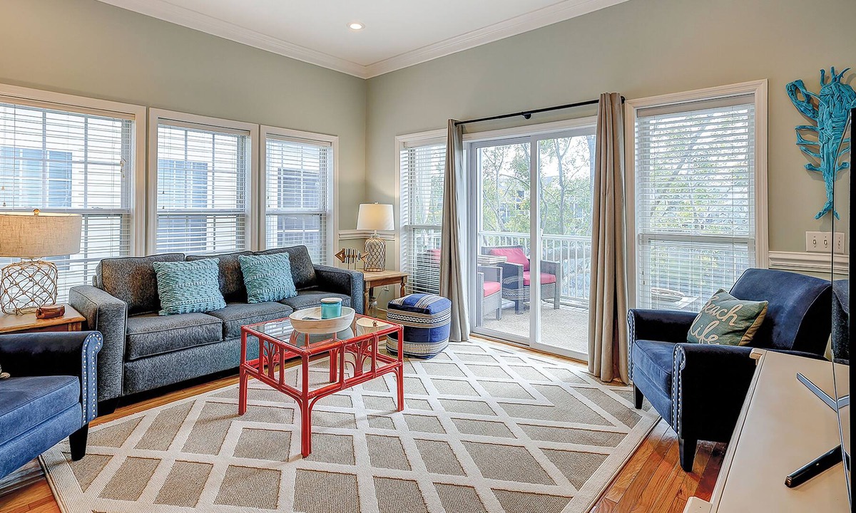 Waters Edge House | Welcoming water view townhome with pool, balcony, deck, & kitchen