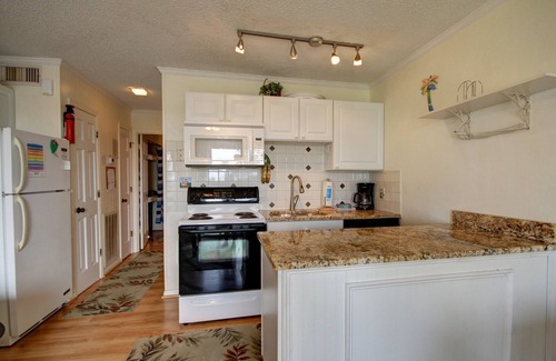 Isle of Palms Condo | Oceanfront 1st Floor Condo! Community Pool & Fishing Pier! Iin the Heart of IOP!