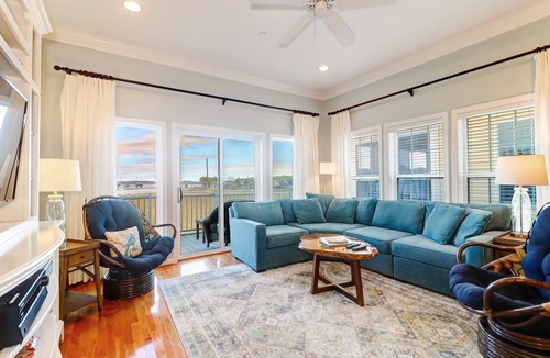 Waters Edge House | 120 Waters Edge! Community pool, screen porch, easy walk to beach, 2 blocks from Center St.