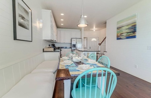 Waters Edge House | 124 Waters Edge! Riverfront Town Home! Screened porch, Community Pool, & Fishing Dock!