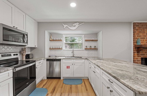 Blue Heron Lake House | Beach Cottage, Golf Cart Included, Pet Friendly - 125 Sea Otter