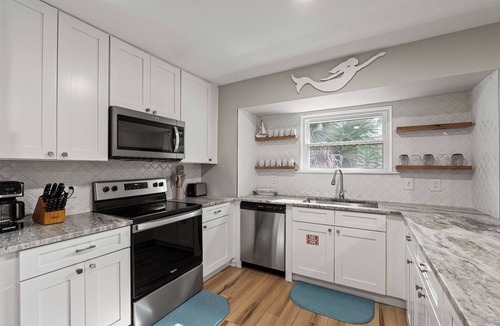 Blue Heron Lake House | Beach Cottage, Golf Cart Included, Pet Friendly - 125 Sea Otter