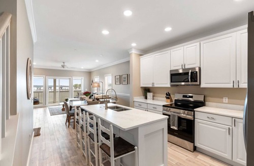 Waters Edge House | Beautiful River Views, Short Walk to Center St and the Beach