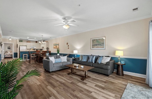 Central Myrtle Beach Condo | Bright and Modern 3BR Family Friendly Condo with pool, golf, Ripken Experience.