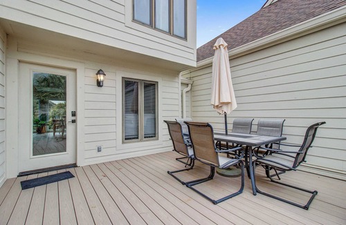 Spinnaker Beachhouses House | Bright villa with lagoon & fairway views - walk to the beach & golf