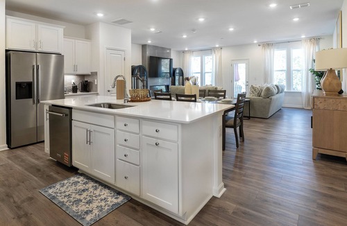 Charlotte House | Charming 3-bedroom townhome with 2 car garage in vibrant Charlotte.