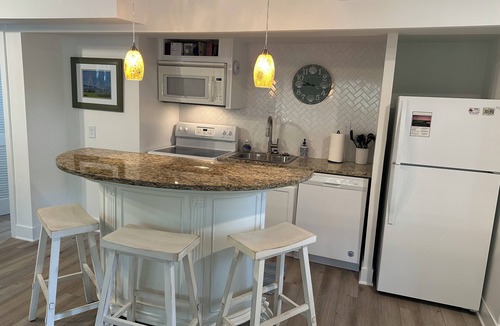 West Beach Village Villa | Charming lower level 1-bedroom Seascape villa just steps from the beach!
