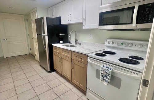 Crescent Beach Resort | Coastal Beachfront Paradise! Resort Style Amenities with a BRAND NEW KITCHEN!