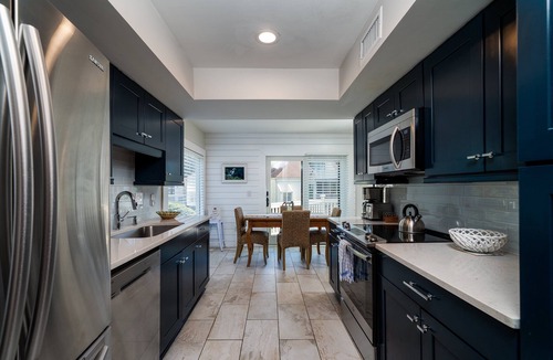 Spinnaker Beachhouses Villa | DESIGNER DECORATED 3 BR Spinnaker! Walk to beach & club! Amenity access! Dog Friendly!