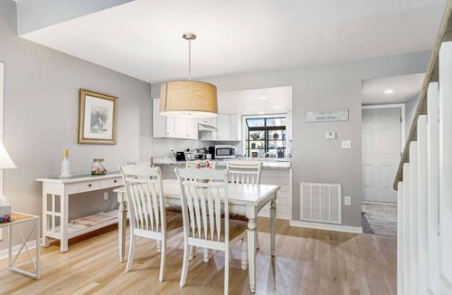Ocean Ridge Condo | Dog-friendly beach home with screened porch, charming interior, & W/D