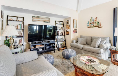 Spinnaker Beachhouses Villa | Dog-friendly villa near beach with pool access, patio, central AC & washer/dryer