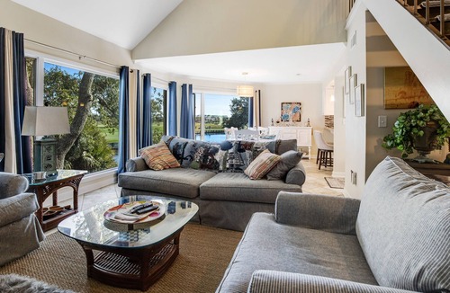 Spinnaker Beachhouses Villa | Dog-friendly villa near beach with pool access, patio, central AC & washer/dryer