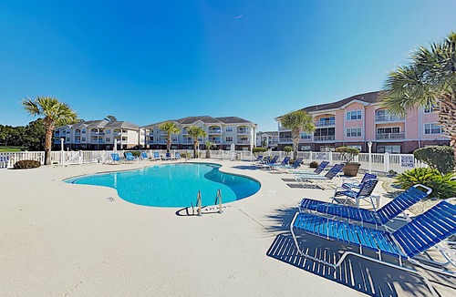 Central Myrtle Beach Condo | Dual-suite Magnolia Pointe condo with golf, pools, and screened patio