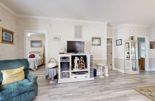 Arcadian Shores Condo | End-unit condo with covered patio, pool, tennis & washer/dryer - dog-friendly