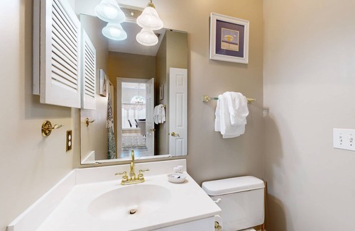 Arcadian Shores Condo | End-unit condo with covered patio, pool, tennis & washer/dryer - dog-friendly