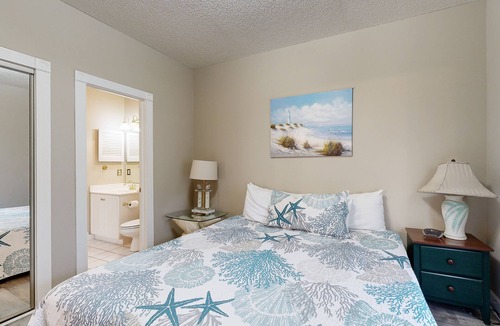 Arcadian Shores Condo | End-unit condo with covered patio, pool, tennis & washer/dryer - dog-friendly