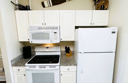 Central Myrtle Beach Condo | Endless Summer Cozy Condo at Magnolia Place - Golf Course Views!