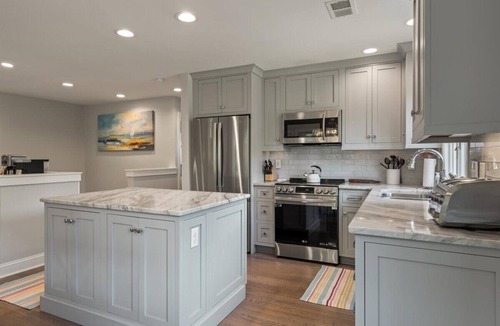 West Beach Village Villa | Fairway Oaks Villa! Lagoon views! Short 5-7 minute stroll to the beach!