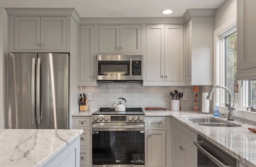 West Beach Village Villa | Fairway Oaks Villa! Lagoon views! Short 5-7 minute stroll to the beach!