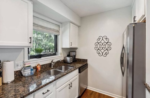 Tarpon Pond Villa | Family -friendly retreat with a short walk to the beach and club area.