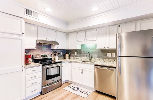 Spinnaker Beachhouses House | Golf-and-sea villa within walking distance of beach + resort amenities