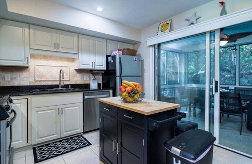 Spinnaker Beachhouses Villa | Great 2 Bedroom Spinnaker w/Golf/Lagoon Views! Amenity access included! Screened Porch!