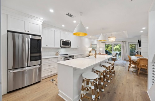 West Beach House | High-End Greenslake Cottage with Pool Access, Lagoon Views - One of the BEST!