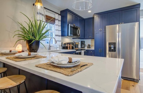 Downtown Charleston Cottage | Historic Cottage walk to King St, fenced yard patio hammock string lights