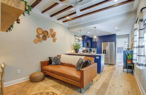 Downtown Charleston Cottage | Historic Cottage walk to King St, fenced yard patio hammock string lights