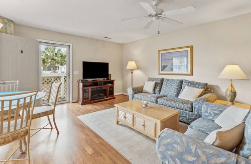 Cherry Grove Beach Condo | Homey condo w/private deck in quiet resort w/fabulous pool & Jacuzzi - one block from the beach