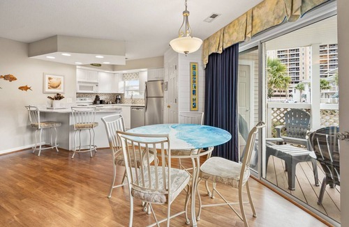 Cherry Grove Beach Condo | Homey condo w/private deck in quiet resort w/fabulous pool & Jacuzzi - one block from the beach