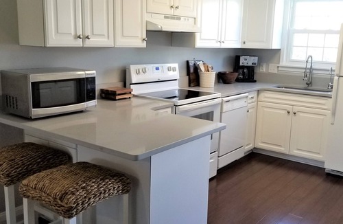 Surfside Beach House | Island House D : Stylish Updated Townhome - Steps to the Beach w/Pool!