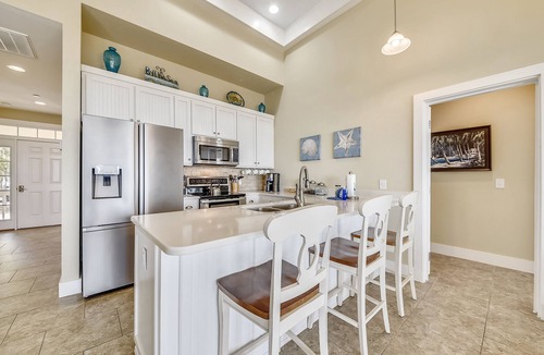 Melrose on the Beach House | JonBie Maison Ocean Serenity Cottage Oceanfront Cart included with Booking.