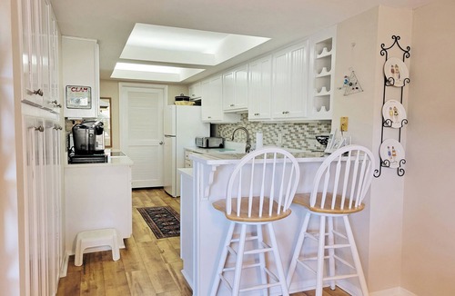 Litchfield by the Sea Condo | Lake Front Townhouse, Beach Access, Screened Porch, Sundeck, 2 Carports, Pool