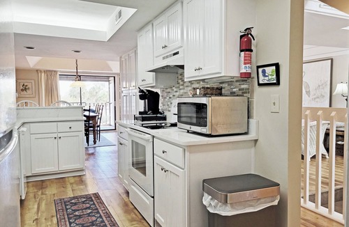 Litchfield by the Sea Condo | Lake Front Townhouse, Beach Access, Screened Porch, Sundeck, 2 Carports, Pool