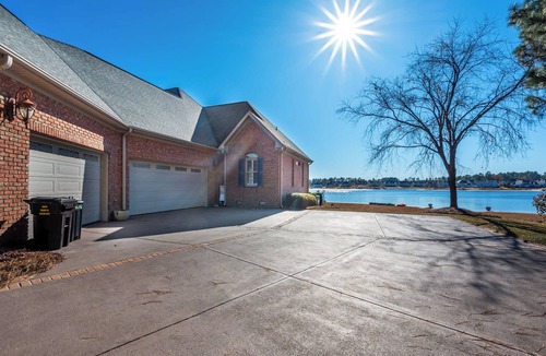 Olivia House | Lakefront Family Retreat with Game Room Fun