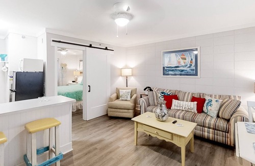 North Myrtle Beach Condo | Nautical beachside condo with pool-view patio - cross street to beach access