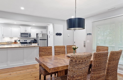 West Beach Cottage | New listing, community pool, easy beach access!