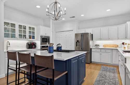 Sea Pines House | Newly updated home w/multiple living spaces offers pool, lagoon & golf views