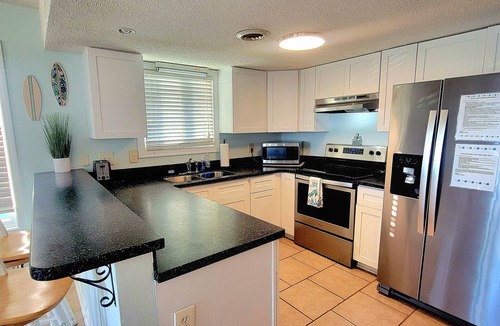North Carolina Coast Condo | Oceanfront + Pool, Pet-friendly, 1st Floor, Next to Pier Tiki Bar and restaurant
