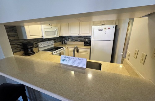 Shelter Cove Condo | One bedroom Harbourside Villa in Shelter Cove Harbour - pool and spa
