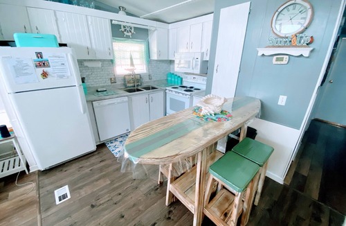 Garden City House | One minute drive to beach with golfcart! Updated, beach decor & clean!