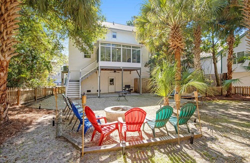 Sunset Point House | Palmetto-lined home with porches, yard & hammock - walk to beach/town